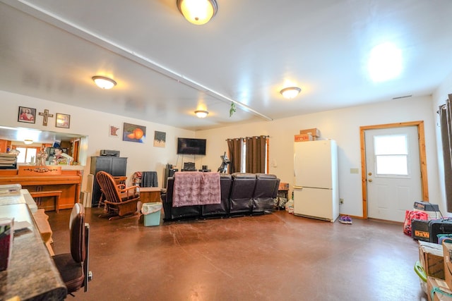 5242 Cusson Loop Rd, Leiding Twp, MN 55771 - living room featuring finished concrete flooring