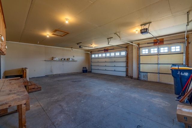 garage featuring a garage door opener