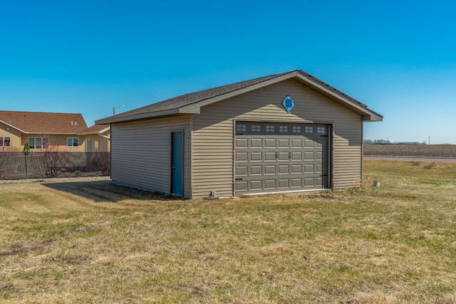 detached garage with fence