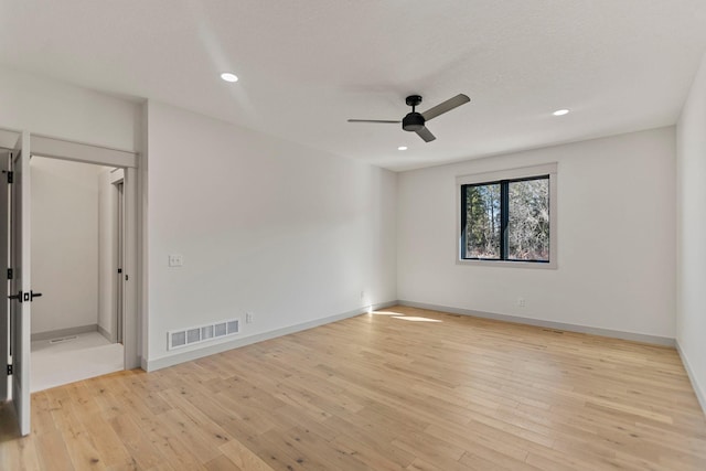 7284 205th St W, Faribault, MN 55021 - empty room featuring a ceiling fan, wood-type flooring, baseboards, visible vents, and recessed lighting