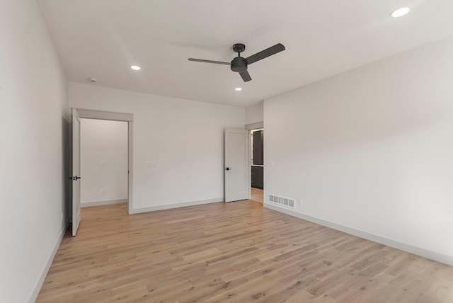 7284 205th St W, Faribault, MN 55021 - unfurnished bedroom with recessed lighting, light wood-style flooring, visible vents, and baseboards