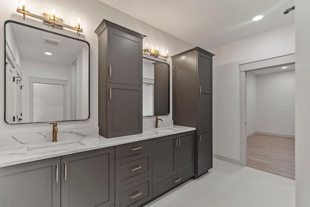 7284 205th St W, Faribault, MN 55021 - full bath featuring visible vents, a sink, recessed lighting, and double vanity