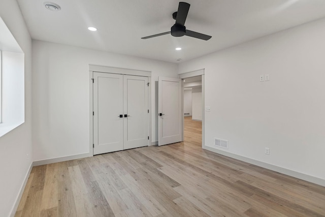 7284 205th St W, Faribault, MN 55021 - unfurnished bedroom with light wood finished floors, baseboards, recessed lighting, and visible vents