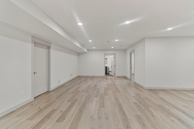 7284 205th St W, Faribault, MN 55021 - finished below grade area with light wood finished floors, baseboards, and recessed lighting