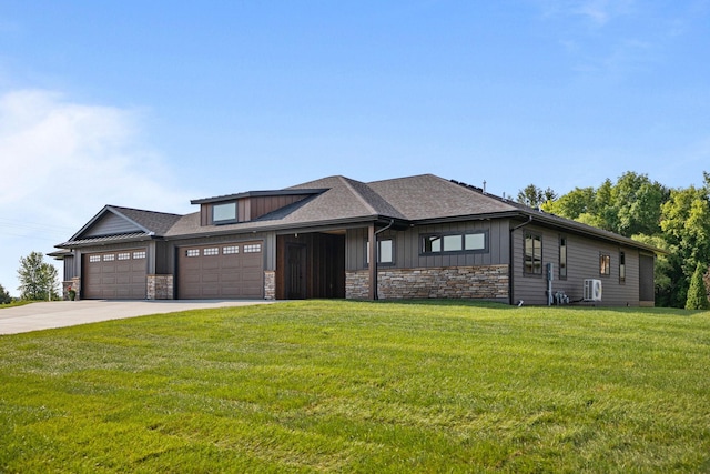 7284 205th St W, Faribault, MN 55021 - view of front of home with a garage, stone siding, driveway, a front yard, and board and batten siding