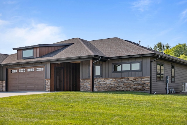 7284 205th St W, Faribault, MN 55021 - view of front of property with an attached garage, stone siding, and roof with shingles