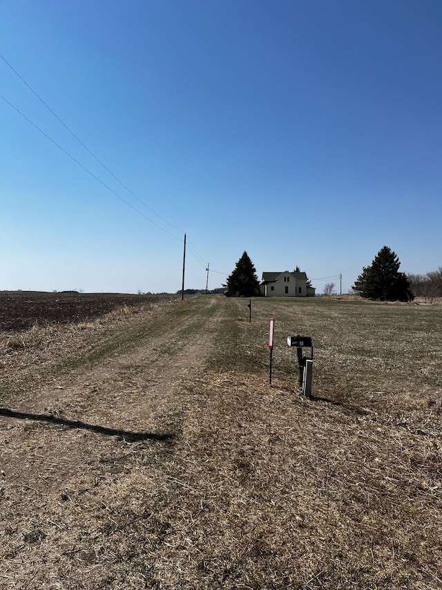view of street featuring a rural view