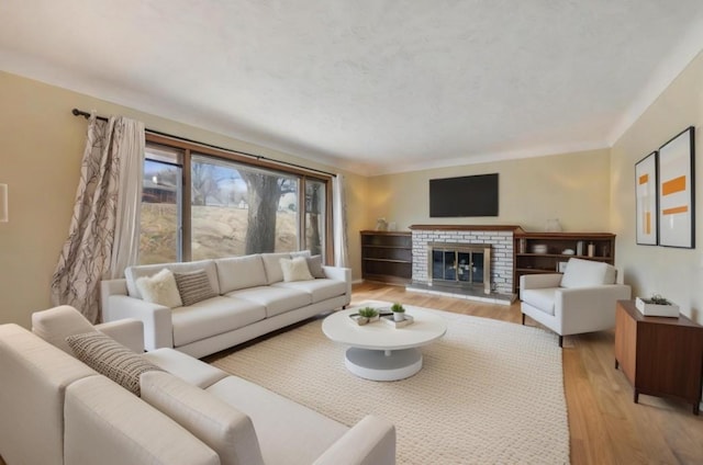 463 Minnesota St S, Stillwater, MN 55003 - living room with light wood-style flooring and a brick fireplace