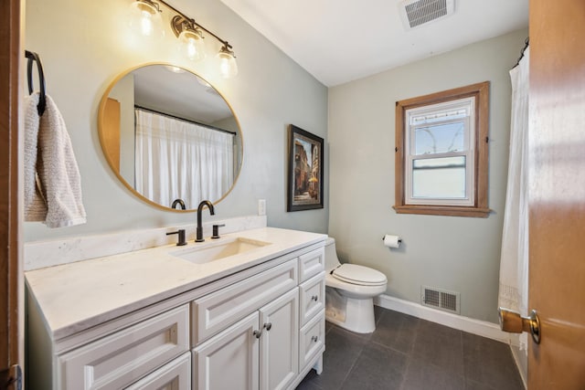 463 Minnesota St S, Stillwater, MN 55003 - bathroom with vanity, baseboards, toilet, and tile patterned floors
