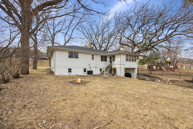 463 Minnesota St S, Stillwater, MN 55003 - rear view of property featuring an outdoor fire pit, stairway, a chimney, and central AC unit
