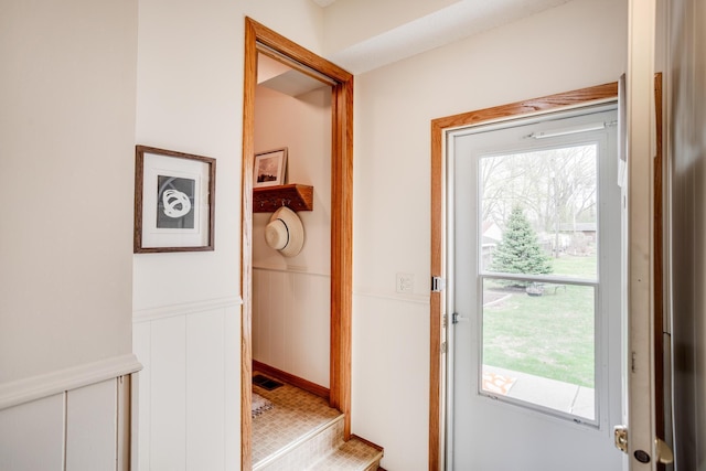entryway featuring wainscoting and visible vents
