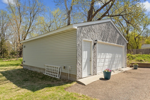 detached garage with fence