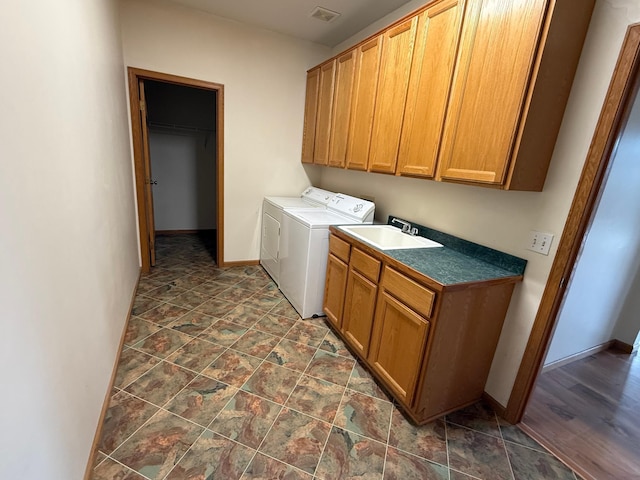 937 Briar Glen Ln, Woodbury, MN 55129 - washroom featuring cabinet space, independent washer and dryer, baseboards, and stone finish flooring