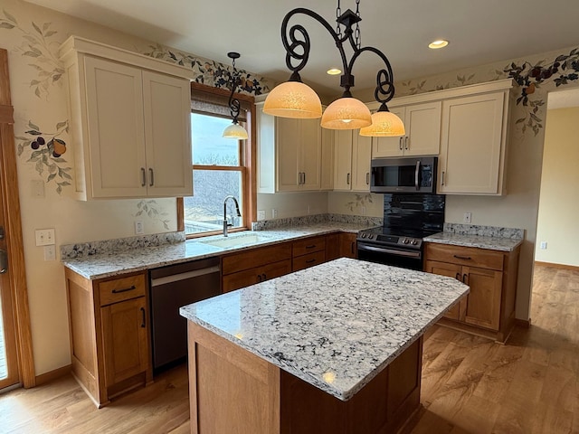 937 Briar Glen Ln, Woodbury, MN 55129 - kitchen featuring stainless steel appliances, a sink, healthy amount of natural light, light wood-type flooring, and recessed lighting