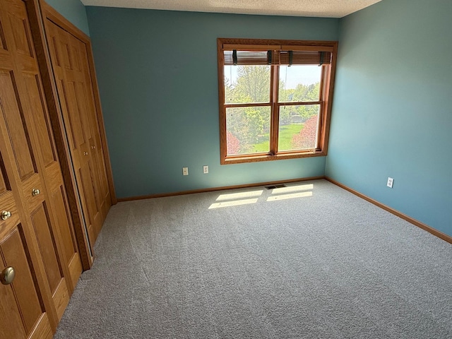 937 Briar Glen Ln, Woodbury, MN 55129 - unfurnished bedroom with carpet flooring and baseboards