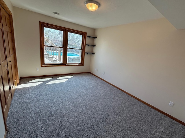 937 Briar Glen Ln, Woodbury, MN 55129 - carpeted spare room with baseboards