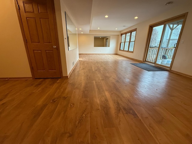 937 Briar Glen Ln, Woodbury, MN 55129 - empty room featuring wood finished floors, baseboards, and recessed lighting