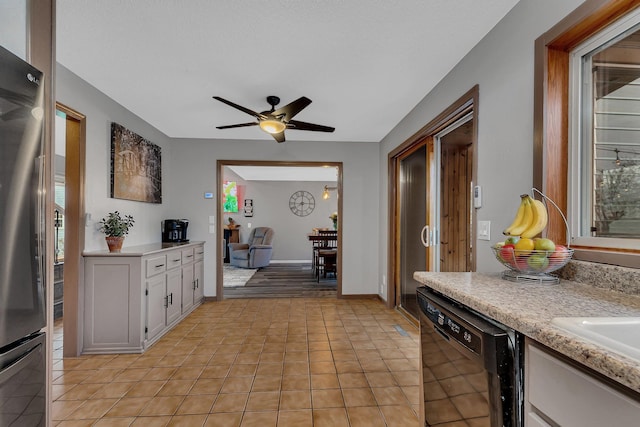 hallway featuring light tile patterned floors