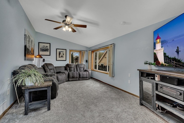 living room with carpet floors, baseboards, ceiling fan, and lofted ceiling