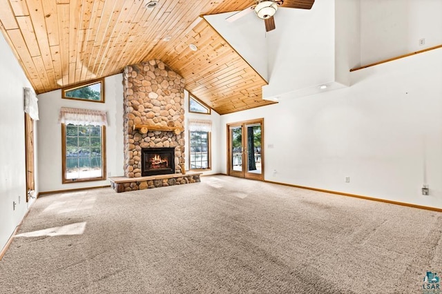 unfurnished living room featuring wooden ceiling and carpet flooring