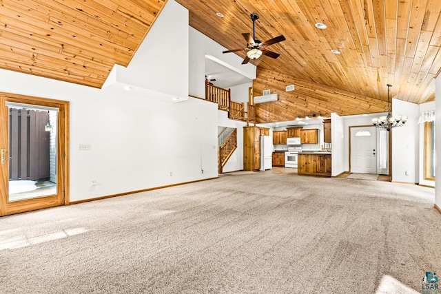 unfurnished living room featuring light carpet, high vaulted ceiling, and wood ceiling