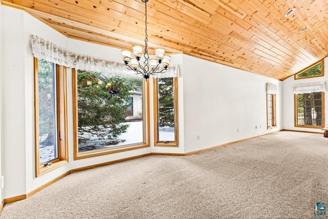 unfurnished dining area with an inviting chandelier, carpet, wood ceiling, lofted ceiling, and baseboards