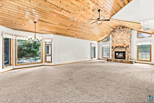 unfurnished living room featuring a fireplace, carpet flooring, baseboards, and wooden ceiling