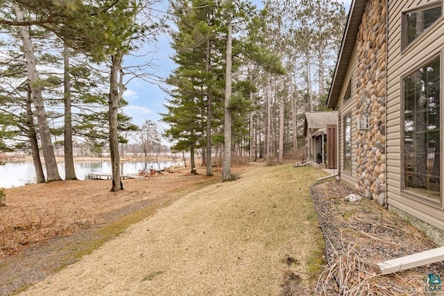 view of yard with a water view