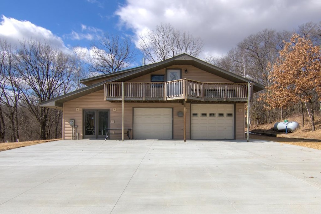 W814 County Road Tt, Mondovi, WI 54755 - view of front of house with an attached garage and concrete driveway