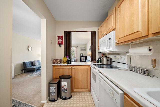 kitchen featuring light countertops, white appliances, decorative backsplash, and light brown cabinets