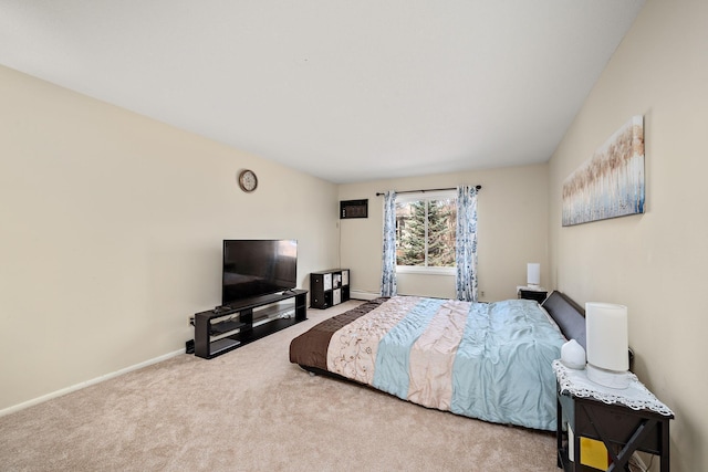 bedroom with baseboards and carpet floors