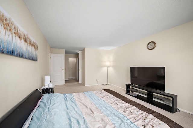 carpeted bedroom with baseboards