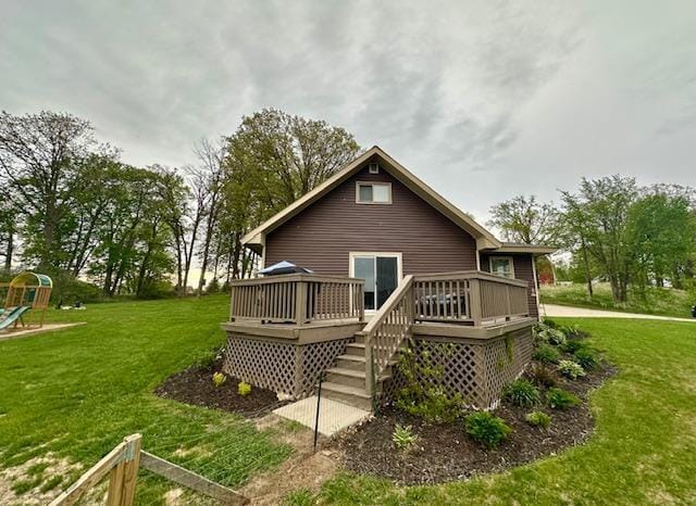 12787 Lumberjack Rd NW, Shevlin, MN 56676 - back of property featuring a yard and a deck