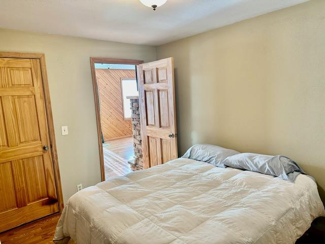 12787 Lumberjack Rd NW, Shevlin, MN 56676 - bedroom with wood finished floors