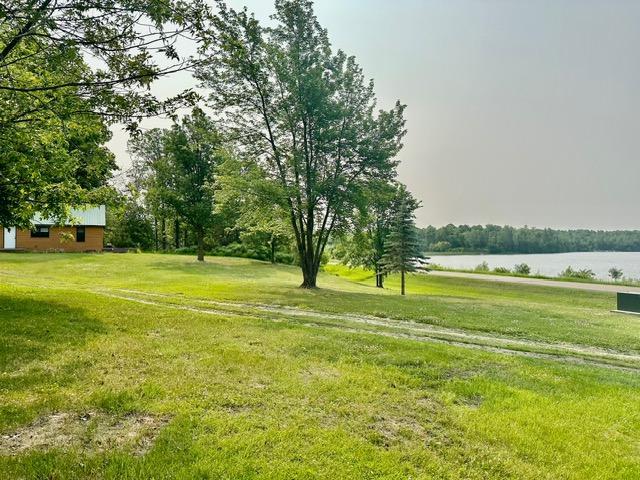 12787 Lumberjack Rd NW, Shevlin, MN 56676 - view of green lawn featuring a water view