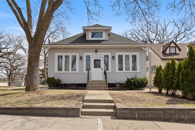 3301 Yosemite Ave S, Saint Louis Park, MN 55416 - bungalow-style house with entry steps and a shingled roof
