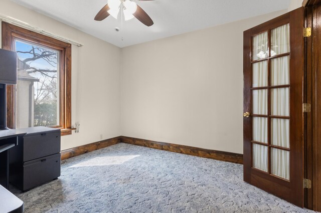 3301 Yosemite Ave S, Saint Louis Park, MN 55416 - carpeted empty room featuring baseboards and a ceiling fan