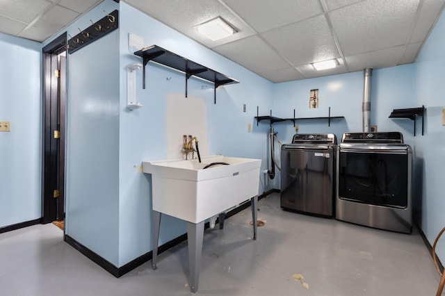 3301 Yosemite Ave S, Saint Louis Park, MN 55416 - laundry room with washing machine and dryer and baseboards