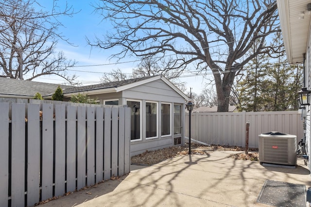 3301 Yosemite Ave S, Saint Louis Park, MN 55416 - view of patio featuring cooling unit and a fenced backyard