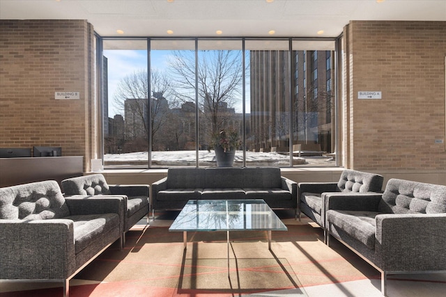 17 1st St Unit A601, Minneapolis, MN 55401 - community lobby with a wall of windows and brick wall