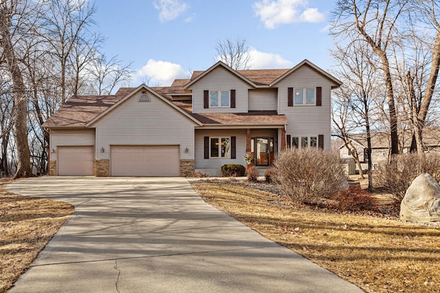 567 Forest Ln, Medford, MN 55049 - view of front of property featuring a shingled roof, driveway, and a garage