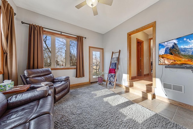 567 Forest Ln, Medford, MN 55049 - living room with ceiling fan, baseboards, tile patterned floors, and visible vents