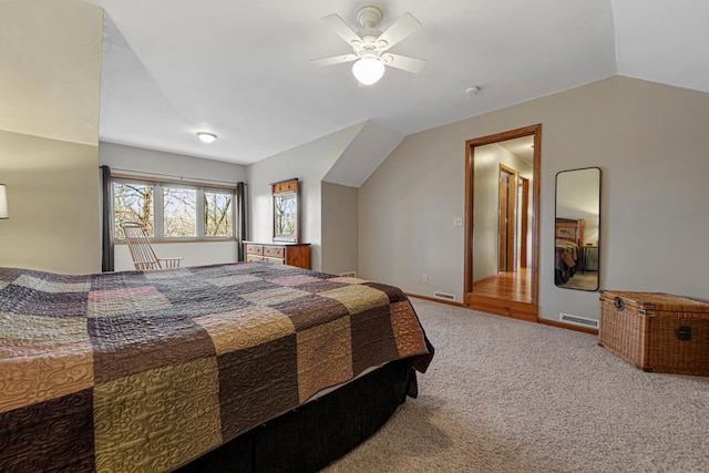 567 Forest Ln, Medford, MN 55049 - carpeted bedroom featuring vaulted ceiling, visible vents, a ceiling fan, and baseboards