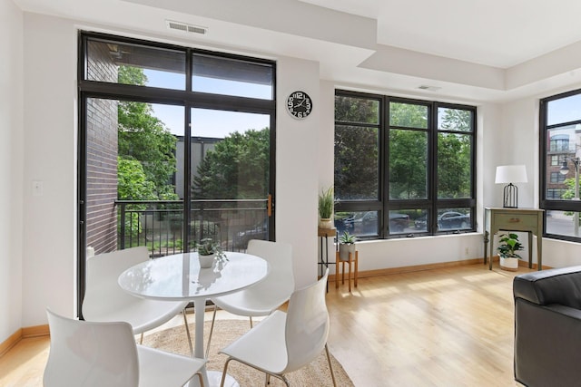 3707 Grand Way Unit 101, Saint Louis Park, MN 55416 - dining space featuring wood finished floors and baseboards