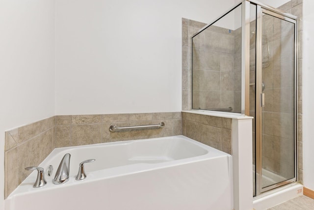 3707 Grand Way Unit 101, Saint Louis Park, MN 55416 - bathroom featuring a stall shower and a garden tub
