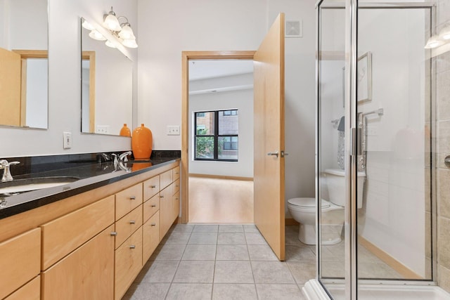 3707 Grand Way Unit 101, Saint Louis Park, MN 55416 - full bathroom with double vanity, a shower stall, toilet, tile patterned flooring, and a chandelier