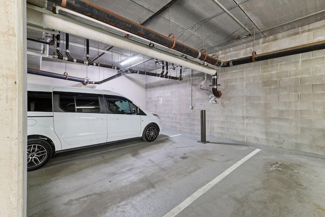 3707 Grand Way Unit 101, Saint Louis Park, MN 55416 - parking garage featuring concrete block wall