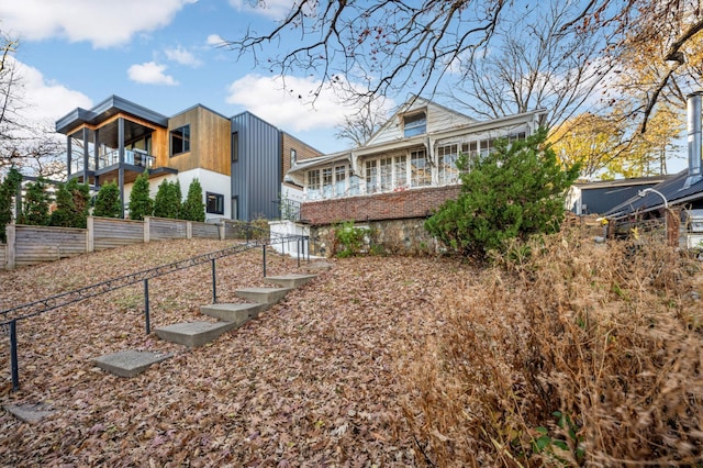 1944 Cedar Lake Pkwy, Minneapolis, MN 55416 - rear view of house featuring fence and a balcony