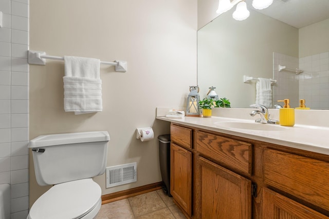 7165 Upper 157th St W, Apple Valley, MN 55124 - bathroom featuring toilet, a shower, vanity, baseboards, and tile patterned floors