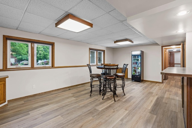 7165 Upper 157th St W, Apple Valley, MN 55124 - dining area with a drop ceiling, light wood finished floors, and baseboards